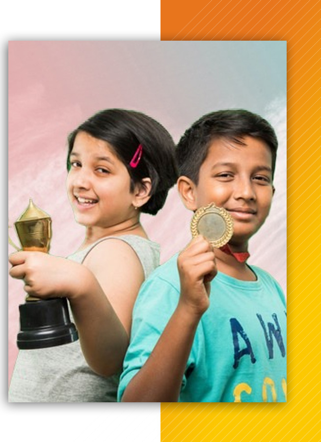 2 students with a medal and trophee